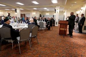 Father David Jones, pastor of St. Benedict the African Parish, speaks during the 21st annual Catholic-Muslim iftar dinner at the Mecca Center in Willowbrook on May 25, 2018. (Karen Callaway/Chicago Catholic)