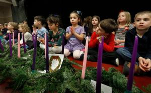 Children wait for their wreaths to be blessed. (Karen Callaway/Chicago Catholic)