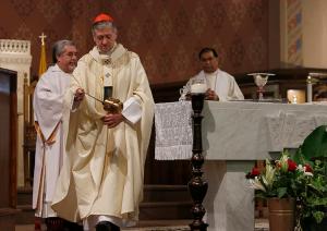 Cardinal Cupich incenses the altar at the beginning of Mass. (Karen Callaway/ Chicago Catholic)