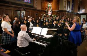 Members of the children’s choir from St. Nicholas sing hymns during Mass. (Karen Callaway/ Chicago Catholic)