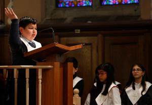 Gianni Luque, a student from St. Nicholas, leads the intentions. (Karen Callaway/ Chicago Catholic)
