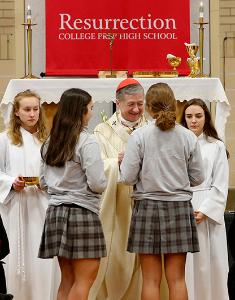 Cardinal Cupich accepts the gifts as he presides during a Mass in celebration of Catholic Schools Week at Resurrection College Prep, 7500 W. Talcott Ave., on Jan. 24, 2020. The Mass honored the Sisters of the Resurrection for their 98 years of service to the school, and the Christian Brothers of the Midwest as they prepare to assume the sponsorship of the school. (Karen Callaway/Chicago Catholic)