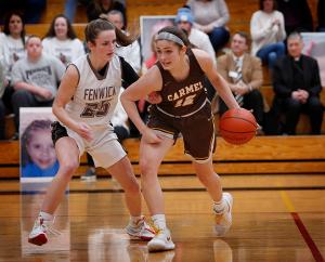 Lily Reardon (#25) of Fenwick defends against Kaytlyn Matz (#12) of Carmel during the game. (Karen Callaway/Chicago Catholic)
