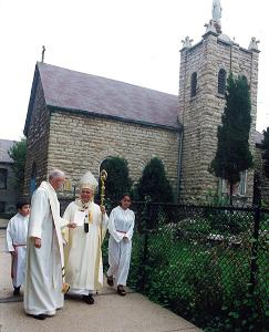Cardinal Francis George, seen near the chapel behind the church, prepares to celebrate the 125th anniversary Mass at St. Procopius Parish on Sept. 21, 2000. (Chicago Catholic file photo)