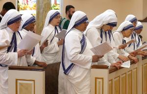 Missionaries of Charity Sisters sing during Mass. St. Mother Teresa of Calcutta Parish hosts a Mass to celebrate the Feast of St. Mother Teresa of Kolkata and mark the 10th anniversary of her canonization with Auxiliary Bishop Mark Bartosic on Sept. 5, 2026, at the St. Therese Chinese Catholic Church worship site in Chinatown. Missionaries of Charity Sisters joined worshippers at Mass to celebrate their founder. The Missionaries of Charity came to Chicago in 1983, when Cardinal Joseph Bernardin welcomed six sisters to St. Malachy Parish on the city’s West Side.  Today, the Missionaries of Charity continue their ministry in Chicago, serving the poor and vulnerable through a soup kitchen and other charitable outreach. (Karen Callaway/Chicago Catholic)
