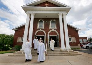 Bishop Manz and priests process out of the final Mass at St. Hugh Parish. (Karen Callaway/Chicago Catholic)