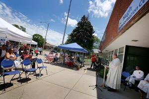 Bishop Manz dedicates the new St. Hugh Faith Formation Center on the Mater Christi worship site. (Karen Callaway/Chicago Catholic)