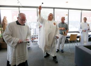 Bishop Manz blesses the new Bishop Timothy J. Lyne Pastoral Center in Riverside that will serve parishioners of the newly formed St. Paul VI Parish on June 27, 2021. (Karen Callaway/Chicago Catholic)