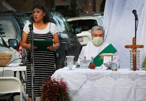 A parishioner proclaims a reading. (Karen Callaway/Chicago Catholic)