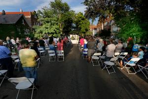 As the sun goes down, the congregation celebrates Mass. (Karen Callaway/Chicago Catholic)