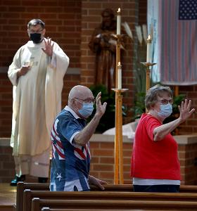 People exchange the sign of peace. (Karen Callaway/Chicago Catholic)