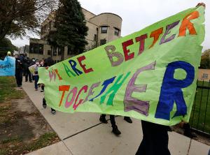Teachers and volunteers joined students in the walk. (Karen Callaway/Chicago Catholic)
