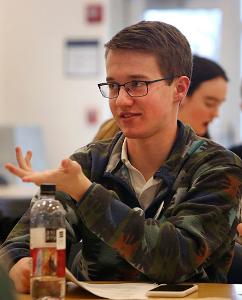 Luke Hughes, a senior at Loyola Academy, shares ideas with his group. (Karen Callaway/Chicago Catholic)