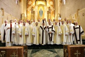 Father Baima poses for a group photo following the ordination of permanent deacons at Queen of All Saints Basilica, 6280 N. Sauganash Ave., on May 24, 2009. (Karen Callaway/Chicago Catholic)