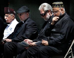 Father Baima joins interfaith leaders for a prayer service led by the Council of Religious Leaders of Metropolitan Chicago at Daley Plaza on July 19, 2016. (Karen Callaway/Chicago Catholic)