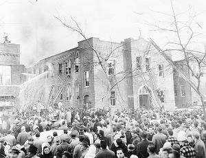 A large crowd gathered to watch Chicago firefighters fight the flames at Our Lady of the Angels School on Dec. 1, 1958. (Chicago Catholic file photo)