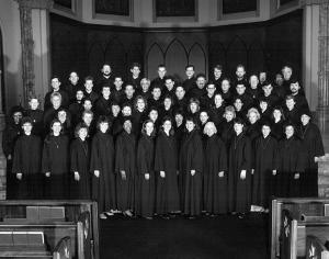 THEN: in June 1998 members of the cathedral choir pose during a rehearsal for an upcoming European concert tour. (Chicago Catholic file photo)