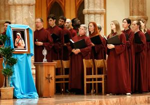 NOW: the cathedral choir stands during a Mass of thanksgiving for the canonization of Mother Teresa at cathedral on Sept. 25, 2016. (Karen Callaway/Catholic New World)