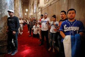Native Nicaraguans filled the church and aisles for the Mass. (Karen Callaway/Chicago Catholic)