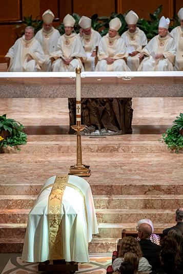 Auxiliary Bishop Robert Lombardo gives the homily during the funeral Mass. Bishop Lombardo was ordained a bishop with Bishop Birmingham and Auxiliary Bishop Jeffrey Grob. (Karen Callaway/Chicago Catholic)