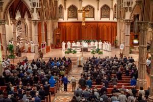 Members of the congregation pray the Our Father during the funeral Mass on Oct. 7, 2023, at the cathedral. (Deacon Randy Belice/Chicago Catholic)