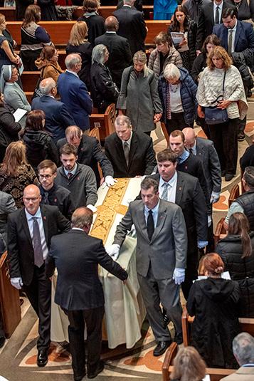 Pallbearers and family members escort the body of Bishop Birmingham out of the cathedral on Oct. 7, 2023. (Deacon Randy Belice/Chicago Catholic)