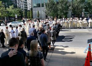 Bishops from the Archdiocese of Chicago and elsewhere join Cardinal Cupich in greeting the body of Bishop Birmingham during the procession to the place of committal on Oct. 7, 2023, at Holy Name Cathedral in Chicago. More than a hundred priests and visiting bishops joined the cardinal and auxiliary bishops to celebrate the life and work of Bishop Birmingham in the archdiocese and beyond. (Karen Callaway/Chicago Catholic)