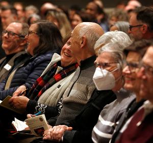 Attendees react to a comment by Cardinal Radcliffe. (Karen Callaway/Chicago Catholic)