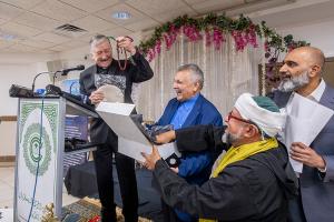 Cardinal Cupich reacts to receiving a gift of prayer beads. (Deacon Randy Belice/Chicago Catholic)
