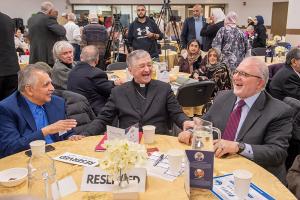 Cardinal Cupich shares a laugh with Masood Bijapuri and Dr. Muhammad Hamedeh. (Deacon Randy Belice/Chicago Catholic)