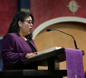 Maria Luz Herrera cantors during the Mass. (Karen Callaway/Chicago Catholic)