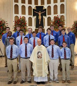 Then-Bishop Prevost with student government members from St. Rita High School, 7740 S. Western Ave., during a 2015 visit to the school. (Photo courtesy St. Rita High School)