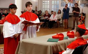 Student cardinals act out the moment they ask Wilk if he accepts his election as pope. (Karen Callaway/Chicago Catholic)