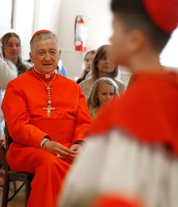 Cardinal Cupich watches the reenactment. (Karen Callaway/Chicago Catholic)