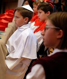 “Pope” Auggie Wilk listens to Cardinal Cupich. (Karen Callaway/Chicago Catholic)