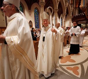 Cardinal Cupich smiles as he walks with bishops, seminarians, priests and deacons in the opening procession. (Karen Callaway/Chicago Catholic)