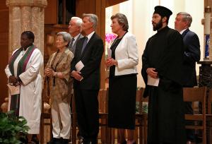 Ecumenical leaders from various religions stand during Mass. (Karen Callaway/Chicago Catholic)