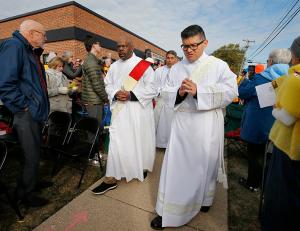 Deacon Leroy Gill from St. Katharine Drexel Parish and Deacon Rafael Yanez from St. Procopius Parish, walk together during the opening procession. (Karen Callaway/Chicago Catholic)